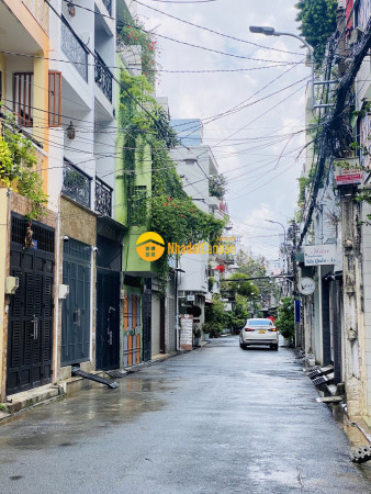 Lê quang định hẻm nhựa 8m 5 tầng 7 phòng ngủ lớn